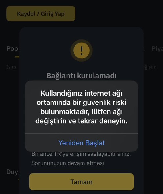 The image shows a Turkish-language security warning popup from Binance TR stating "Bağlantı kurulamadı" (Connection failed), alerting the user that the current internet network poses a security risk and instructing them to change networks and try again, with a "Yeniden Başlat" (Restart) option.

This screenshot directly illustrates the post's warning about security risks when accessing Binance TR, emphasizing the importance of being cautious about the network environment used to access cryptocurrency platforms.