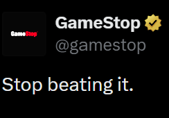 A social media post from the verified GameStop account (@gamestop) with the text 'Stop beating it.'