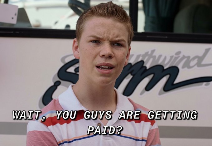 The image shows a young man wearing a pink polo shirt with white stripes, standing next to a large RV (recreational vehicle) that has "Southwind" written on it. The text above his head reads "WAIT, YOU GUYS ARE GETTING paid?". This suggests that the young man is receiving payment for his work or participation in an event related to the RV.