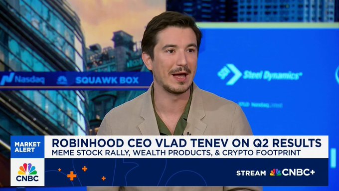 A CNBC Squawk Box interview featuring Robinhood CEO Vlad Tenev, with on-screen text reading 'MARKET ALERT', 'ROBINHOOD CEO VLAD TENEV ON Q2 RESULTS', 'MEME STOCK RALLY, WEALTH PRODUCTS, & CRYPTO FOOTPRINT', and 'STREAM CNBC+'.