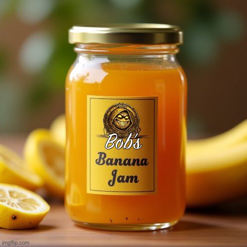A glass jar with a gold lid filled with orange jam sits on a wooden surface, labeled 'Bob's Banana Jam', surrounded by fresh lemons and bananas.
