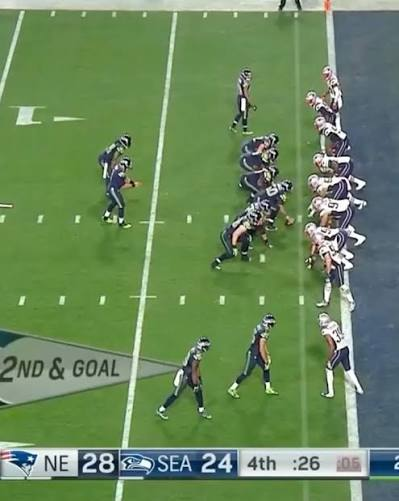 An NFL game screenshot showing the New England Patriots (28) leading the Seattle Seahawks (24) in the 4th quarter with 26 seconds left on 2nd & Goal.