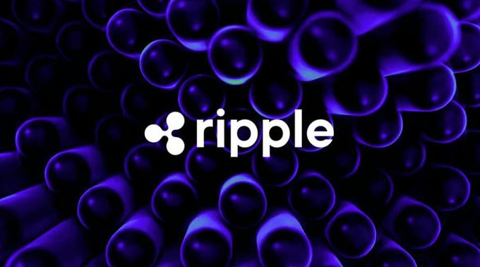 Ripple logo displayed in white against a dark purple background of glossy bubble-like spheres.