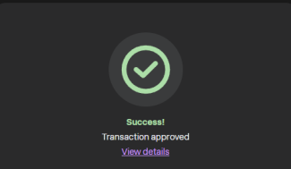 A digital interface showing a successful transaction approval with a green checkmark icon and the text 'Success! Transaction approved' followed by a 'View details' link.