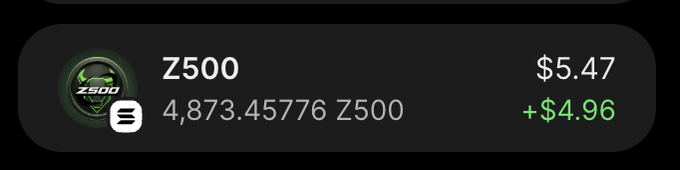 A cryptocurrency wallet interface showing a balance of 4,873.45776 Z500 tokens, valued at $5.47 with a positive change of +$4.96.
