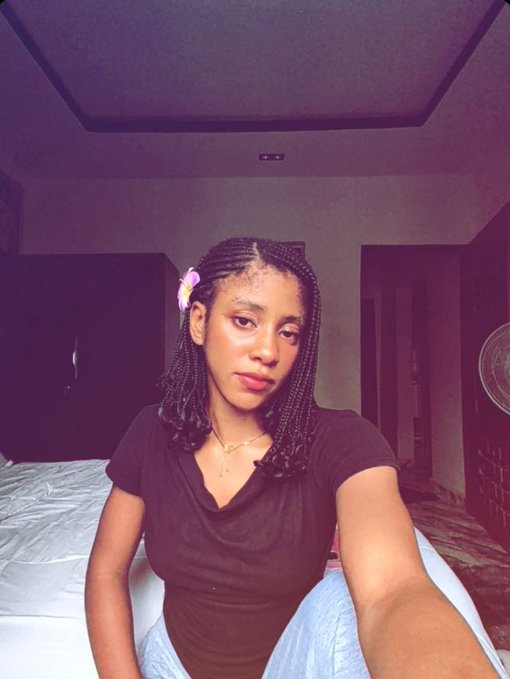 Diana Marcus sits on a bed taking a selfie, her braided hair and black top complementing the post where she proudly announces her achievement as a house owner at 20, giving a morning shoutout while crediting web3 and @monad.