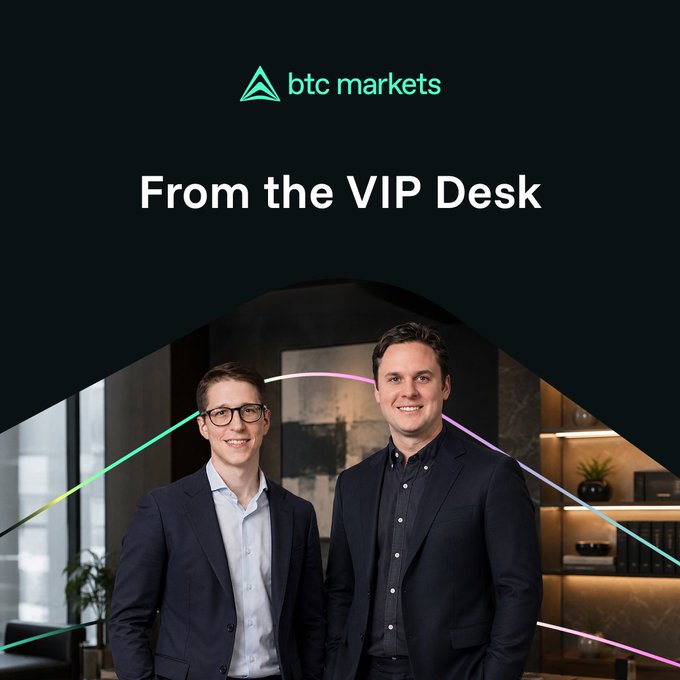 A promotional graphic for BTC Markets titled 'From the VIP Desk' showing two smiling men in business attire standing in front of a modern interior with neon light streaks.