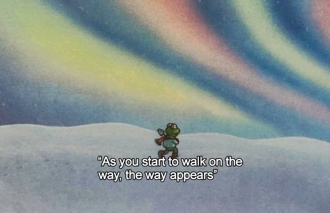 A whimsical illustration of a small frog character standing in a snowy landscape under an aurora borealis sky, with the caption 'As you start to walk on the way, the way appears'.