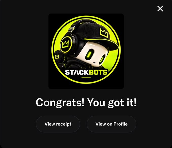 A 'Congrats! You got it!' notification screen featuring a logo for 'STACKBOTS' showing a robot character wearing a black cap with a crown logo and green headphones, with buttons for 'View receipt' and 'View on Profile'.