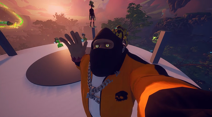 The image features a man wearing an orange jacket, black pants, and a black mask standing on top of a platform or structure. He appears to be taking a selfie using his phone while looking directly at the camera. The background includes trees and mountains, suggesting that they are in a natural setting like a forest or a mountainous area. The post about GM Everyone! seems to be related to this scene as it might be discussing the man's experience of being on top of the structure or sharing some interesting facts about the location where he is taking his selfie.