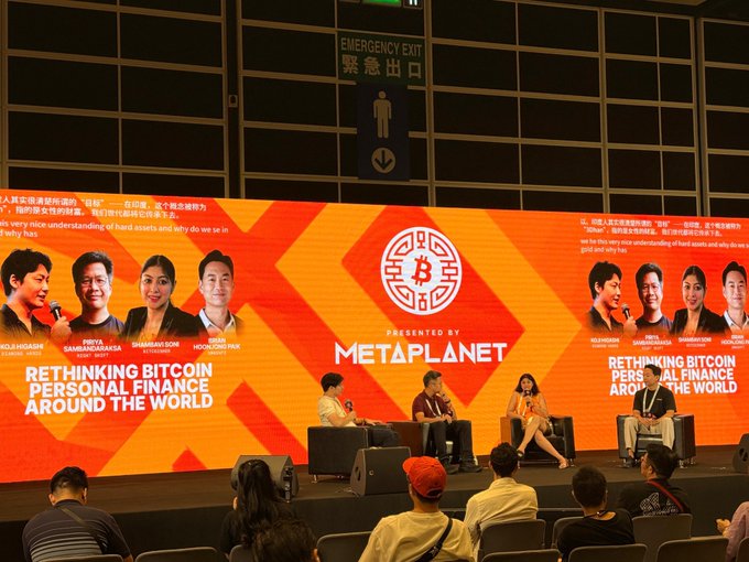 A panel discussion at a MetaPlanet Bitcoin conference titled 'Rethinking Bitcoin Personal Finance Around the World', featuring speakers including Hojl Hishashi, Finb Sabanrakasa, and Ramanya Sone.