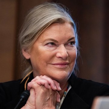 Senator Cynthia Lummis clasps her hands and smiles while speaking, illustrating her optimistic support for the upcoming CLARITY Act in the Senate.