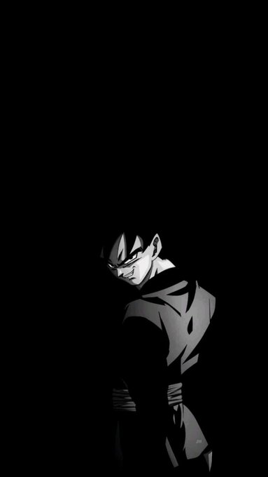 A dark, dramatic image of an anime character (appearing to be Vegeta) in shadow with a menacing grin against a black background.