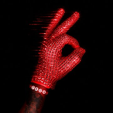 A hand wearing a red LED light display forms an "OK" gesture against a black background, with "COINDESK" visible on the wristband, symbolically representing approval or endorsement of the CLARITY Act for advancing digital asset compliance.