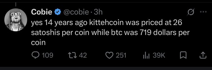 The image shows a tweet from verified user Cobie (@cobie) stating "yes 14 years ago kittehcoin was priced at 26 satoshis per coin while btc was 719 dollars per coin," referencing the historical price of Kittehcoin in relation to Bitcoin. This relates to the accompanying post by highlighting the early valuation of the meme coin $KITTE (Kittehcoin), which is now launching on the Base chain at just a $5K market cap, emphasizing its extremely low entry point compared to its BTC-denominated price from over a decade ago.
