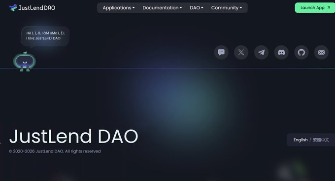 The image features a screenshot of a computer screen displaying a webpage for "JustLendDAO" which appears to be an application related to cryptocurrency lending or financial services. The background color of the image is dark blue, while the text on the page indicates that the app provides a lending platform and is available in multiple languages (English and Chinese), with English being the primary language. This multilingual feature can facilitate global adoption of the app and connect it with diverse user bases worldwide.