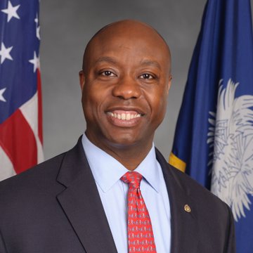 The image shows Senator Tim Scott, the Senate Banking Committee Chairman, smiling in an official portrait with an American flag and South Carolina state flag in the background. The caption relates to his stated commitment to bringing The CLARITY Act to a vote, though the poster remains skeptical until action is taken.