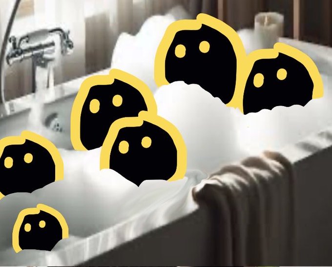 The image features a group of five black, round objects floating in a bathtub filled with white bubbles. These objects are described as "black blob" characters that appear to be enjoying their time in the tub. The scene also includes a towel on the side of the tub and a sink nearby.