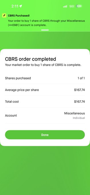 A Robinhood notification confirms that a market order for 1 share of CBRS has been completed, showing an average price per share of $167.74 and a total cost of $167.74 from the Miscellaneous account.