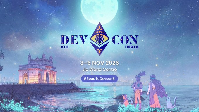 A promotional banner for Devcon 8 India, displaying the dates "3–6 Nov 2026" at "Jio World Centre" with the hashtag "#RoadToDevcon8," featuring an illustrated scene of the Gateway of India under a moonlit sky with two characters looking out at the sea. The image visually complements the post by highlighting Devcon's upcoming location in Mumbai as the Ethereum community's annual physical gathering place.