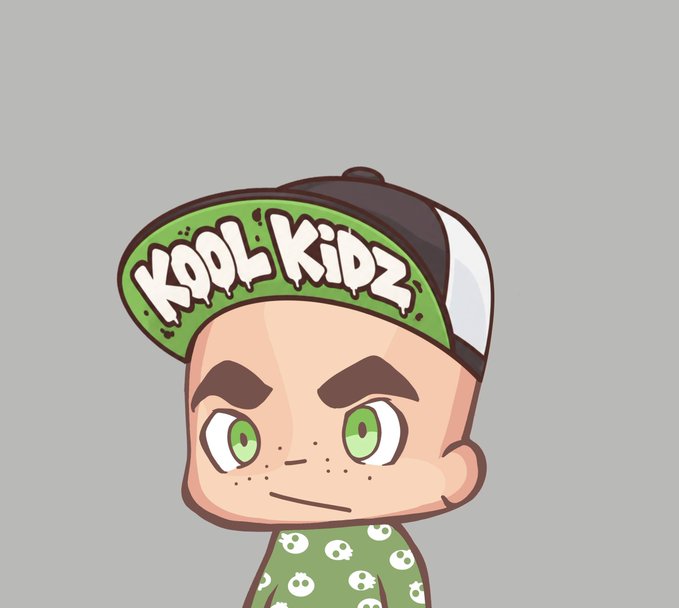 A chibi cartoon character with a backwards brown cap reading 'KOOL KIDZ' in white letters on green, wearing a green shirt with white skull patterns, and having large green eyes and freckles.