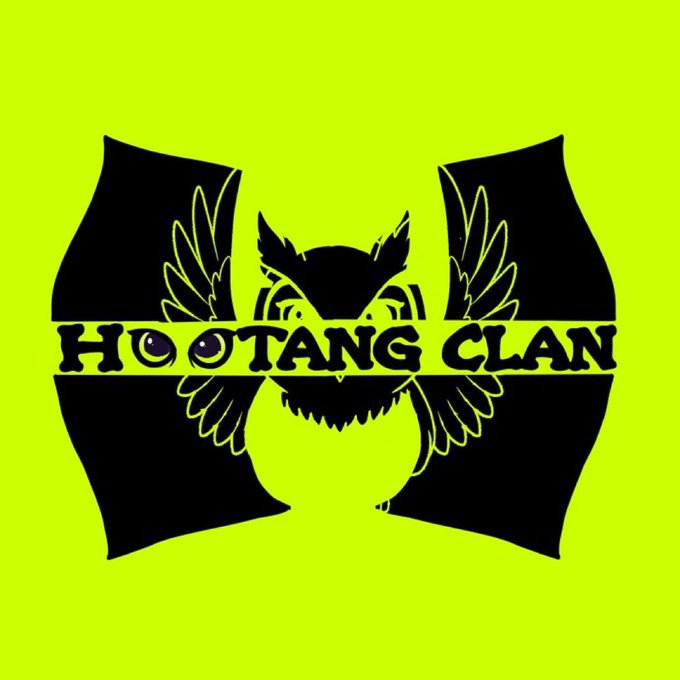 The image is a vibrant yellow logo for "Hoo Tang Clan," featuring a black owl with outstretched wings behind the bold text, visually reinforcing the NFT project's branding as mentioned in the post about its 3,636 PFPs and ecosystem ties across $INJ and $ETH.