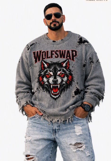 A man wearing sunglasses and a distressed gray sweater featuring a snarling wolf graphic and the word "WOLFSWAP" in red letters, paired with ripped light blue jeans.