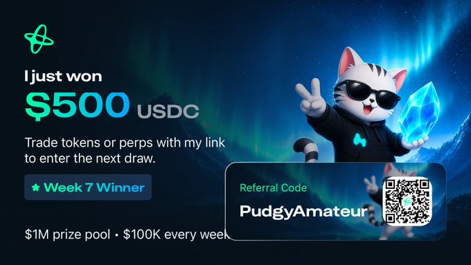 A promotional banner featuring a cat mascot in sunglasses holding a blue crystal, announcing 'I just won $500 USDC' as 'Week 7 Winner' on a trading platform, with a referral code 'PudgyAmateur' and a $1M prize pool / $100K every week giveaway.