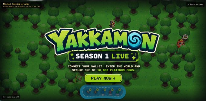 The promotional graphic for Yakkamon announces "SEASON 1 LIVE" with a call to "Connect your wallet, enter the world and secure one of 10,000 Platinum Eggs," featuring a pixel-art forest backdrop with characters and a "PLAY NOW" button that matches the post's message about Season 1 launching and inviting users to join via the Yakkamon snapshot.