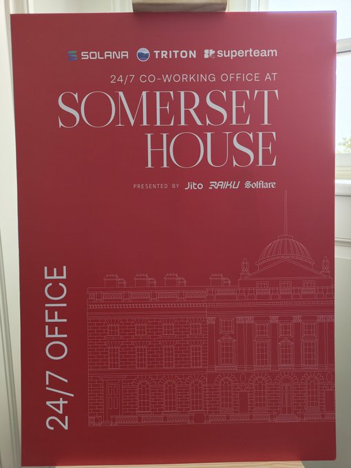 Red promotional poster for a 24/7 co-working office at Somerset House, presented by Solana, Triton, Superteam, Jito, RAIHU, and Solfare.