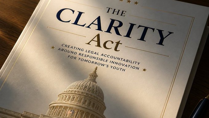 A formal document titled "THE CLARITY Act" with the subtitle "Creating Legal Accountability Around Responsible Innovation for Tomorrow's Youth" rests on a wooden surface, featuring an illustration of the U.S. Capitol dome. The image visually anchors the post's update on the stalled legislation, with the bill's title and governmental imagery underscoring the Senate's ongoing delays and unresolved Democratic concerns regarding ethics, AML protections, and other key issues.