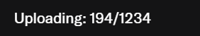 Black screen displaying white text that reads 'Uploading: 194/1234', indicating progress of an upload process.