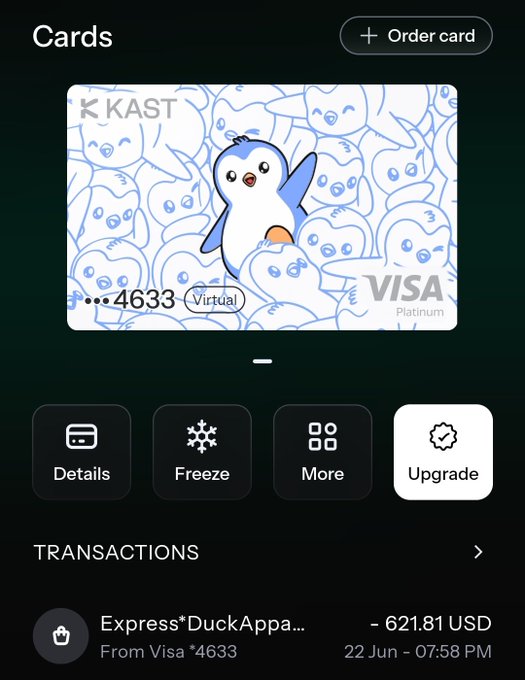 The image shows an app screen with a credit card reader displayed. The main focus of the image is a penguin design on the credit card reader's background. The text on the screen indicates that the user has successfully used their KAST x pudgypenguins card for transactions, and the cashback was credited immediately after the payment. The app also provides information about the cashback process and how to use it correctly.
