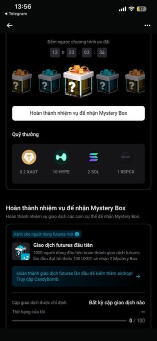 A screenshot of a mobile app interface in Vietnamese displaying a countdown timer, Mystery Box rewards including 0.2 XAUT, 10 HYPE, 2 SOL, and 1 RSPCK, and information about future trading tasks.