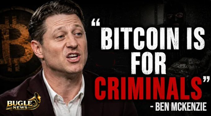 A Bugle News thumbnail featuring Ben McKenzie with the quote 'BITCOIN IS FOR CRIMINALS' displayed in white and red text against a dark background.