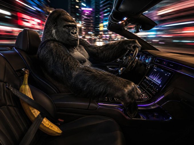A surreal image of a gorilla driving a car at night through a city with neon lights and motion blur, with a banana visible on the passenger seat.