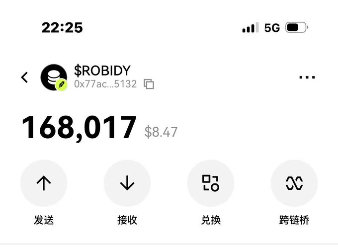 A mobile crypto wallet screenshot displaying a balance of 168,017 $ROBIDY tokens (worth $8.47) at wallet address 0x77ac…5132, with action buttons for sending, receiving, swapping, and cross-chain bridging, illustrating the receipt of the newly minted $ROBIDY token from the Robidy platform.
