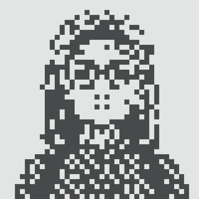 Pixelated black and white portrait of a person with short hair and freckles wearing a textured sweater.