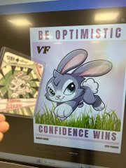 A motivational poster features the cartoon character Bugs Bunny with the text 'BE OPTIMISTIC' at the top and 'CONFIDENCE WINS' at the bottom.