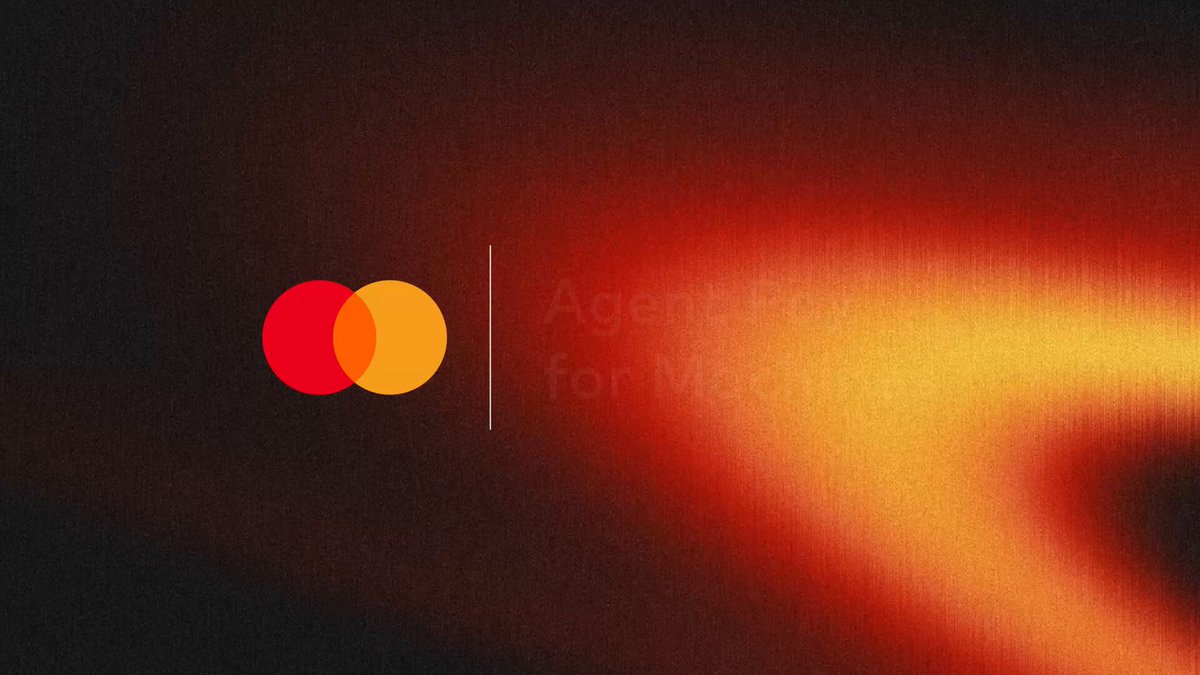 The image features an advertisement for Mastercard's new operating model called @Mastercard Agent Pay for Machines. The background of the image is dark, creating a dramatic effect that highlights the red circles representing Mastercard and the yellow circle symbolizing the new payment system. The text in the image reads "Introducing @Mastercard Agent Pay for Machines, a new operating model for commerce. Aave is proud to be among the partners bringing this to life, providing the credit layer with the deepest liquidity for agents to borrow and earn."