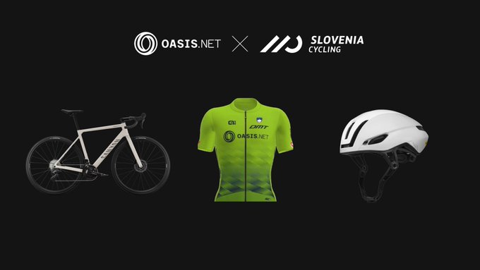 A promotional image for a partnership between 'OASIS.NET' and 'SLOVENIA CYCLING', showing a white road bike, a neon green cycling jersey, and a white helmet on a black background.