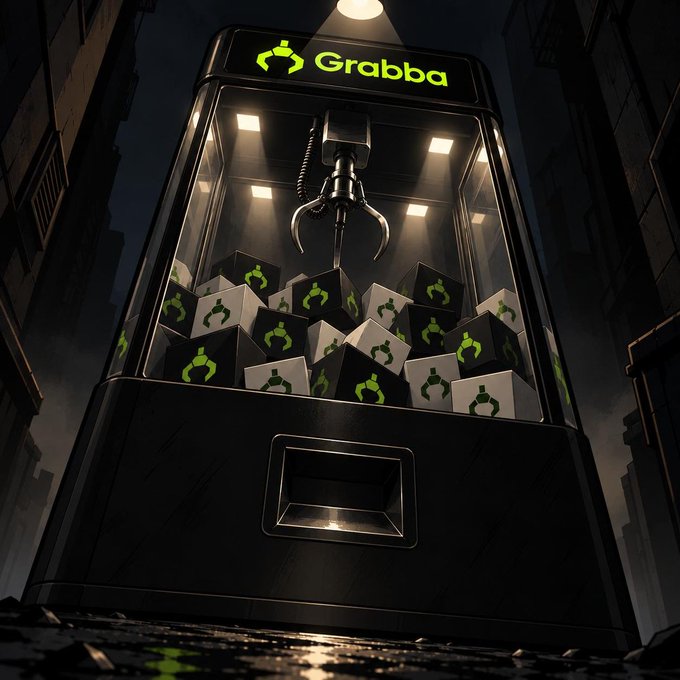 A glowing "Grabba" claw machine stands in a dark city alley, filled with branded boxes featuring the green Grabba logo, while its mechanical claw reaches down to grab prizes. The image visually reinforces the post's message about Grabba's upcoming launch on the Robinhood Chain with an arcade-style claw machine experience for winning crypto and collectibles.