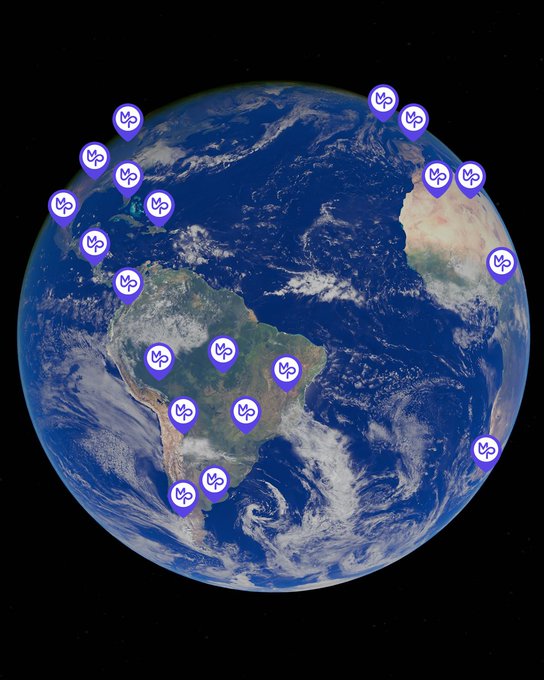 A graphic of Earth from space with numerous purple location pins (each showing a stylized 'W' or Bitcoin 'B') scattered across the continents, likely representing global node or server locations.