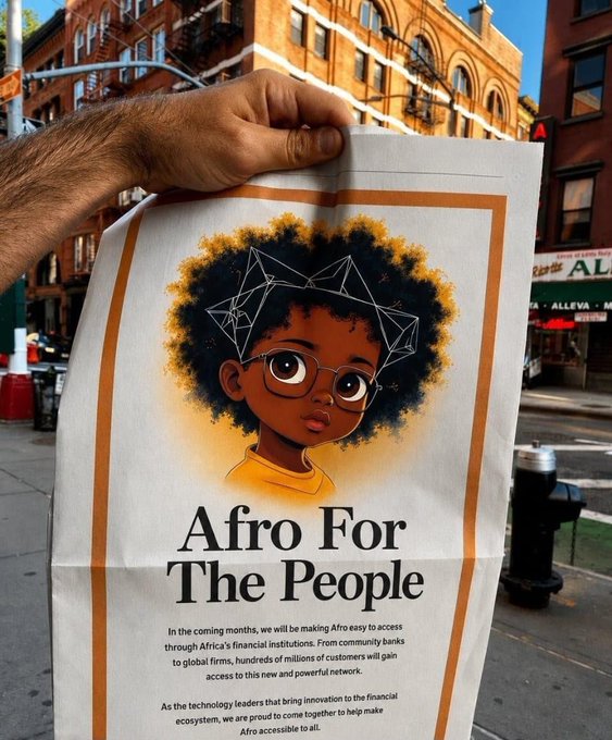 A hand holding up a printed poster on a city street featuring an illustrated child with an afro and the bold text 'Afro For The People', promoting financial access through African institutions.
