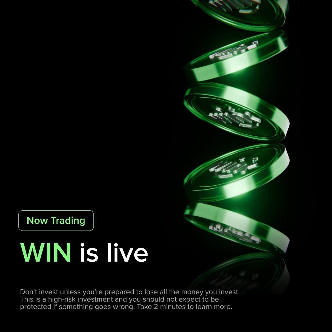 A promotional graphic announcing 'WIN is live' and 'Now Trading' with green cascading tokens, including a disclaimer about the high-risk nature of the investment.