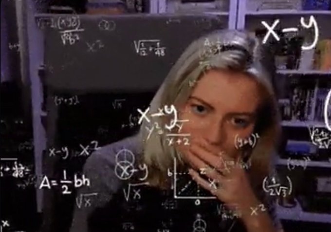 xty is written on a blackboard, surrounded by mathematical equations and symbols, with a woman's face partially obscured behind the board.