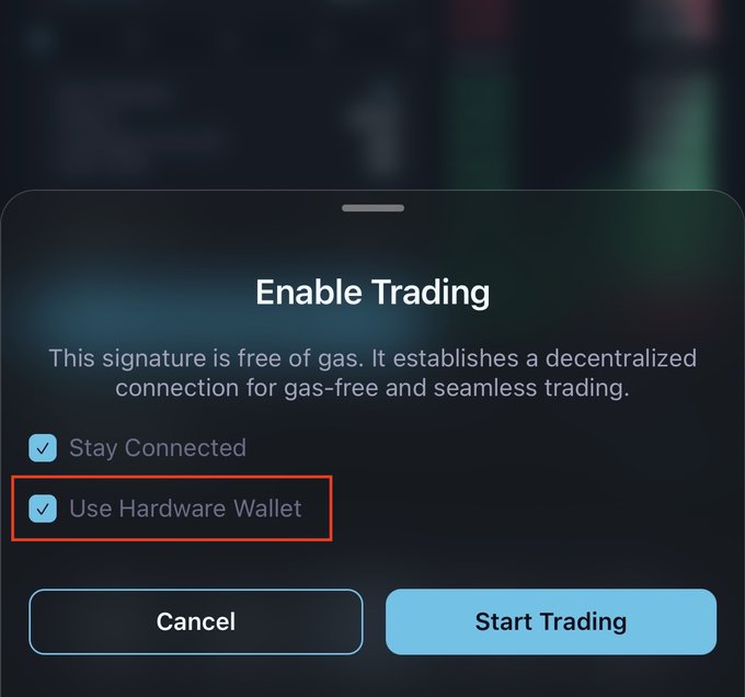 A mobile "Enable Trading" dialog box appears, featuring a checked "Use Hardware Wallet" option highlighted with a red rectangle, alongside options to "Stay Connected," "Cancel," or "Start Trading." This visual demonstrates the new feature that allows users to connect their hardware wallet for gas-free, decentralized trading on mobile, directly reflecting the post's announcement.