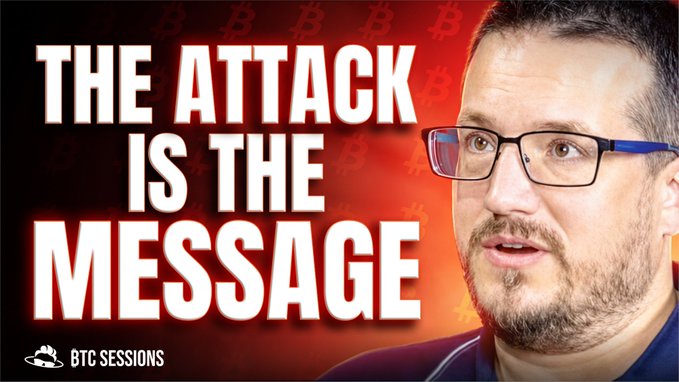 A BTC Sessions thumbnail featuring a man with glasses on a red background with Bitcoin logos, displaying the text 'THE ATTACK IS THE MESSAGE'.