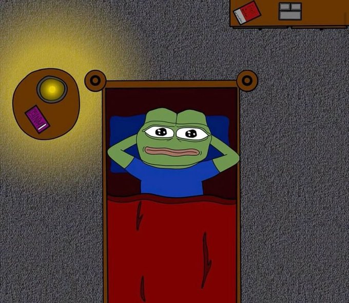An illustration of Pepe the Frog lying in bed looking anxious under the glow of a yellow lamp.