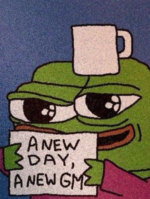 "A New Day, GM" is written above a cartoon frog holding a sign that says "A New Day". The image also includes text about a new project called "@NomismaNetwork", which focuses on building AI natively within the ecosystem for better security and less reliance on centralized chains.